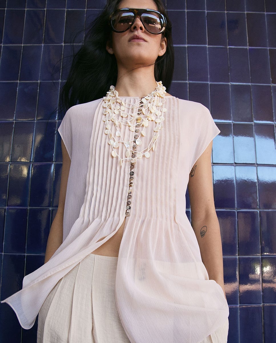 Blusa blanca sin mangas Blusa blanca sin mangas