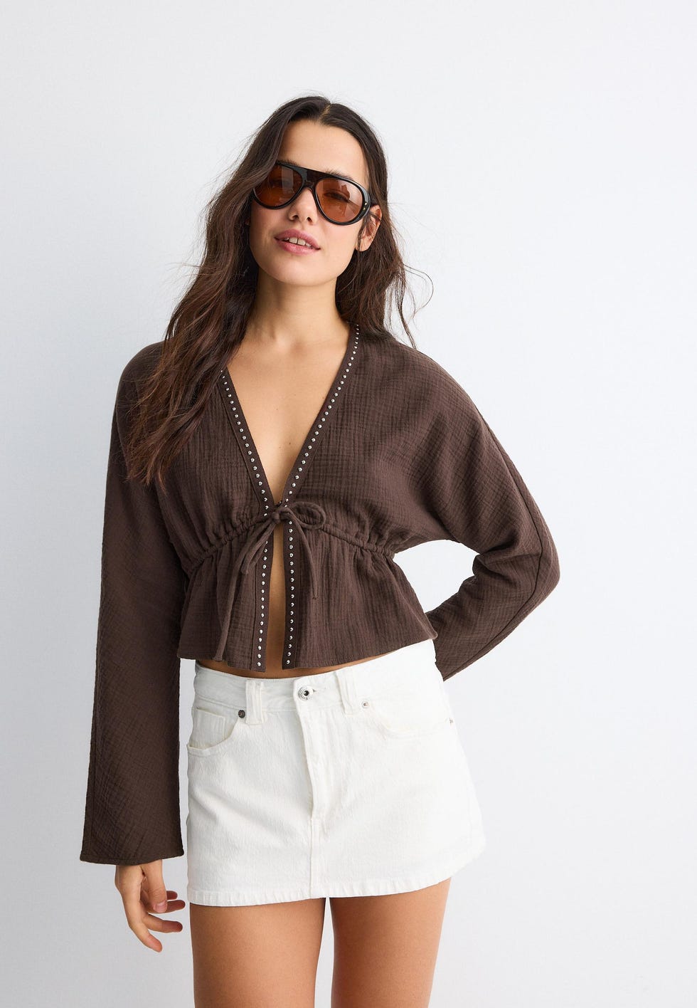 Blusa fluida lazada abierta Blusa fluida lazada abierta